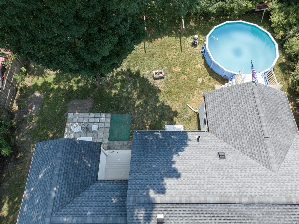 20 Drexel Street Springfield, MA 01104 - Photo 27 of 32 an aerial view of a house with a yard and large trees