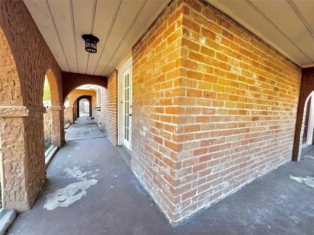 a view of a hallway with entryway