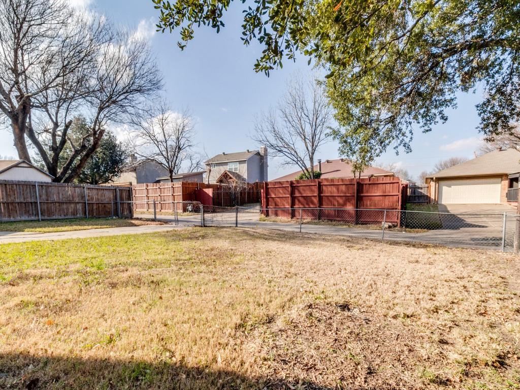 2321 Colonial Mesquite, TX 75150 - Photo 23 of 25 a swimming pool with wooden fence