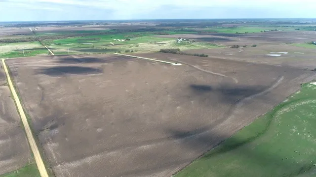 an empty room with wooden floor