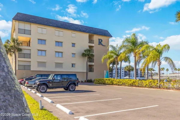 a car parked in front of a building
