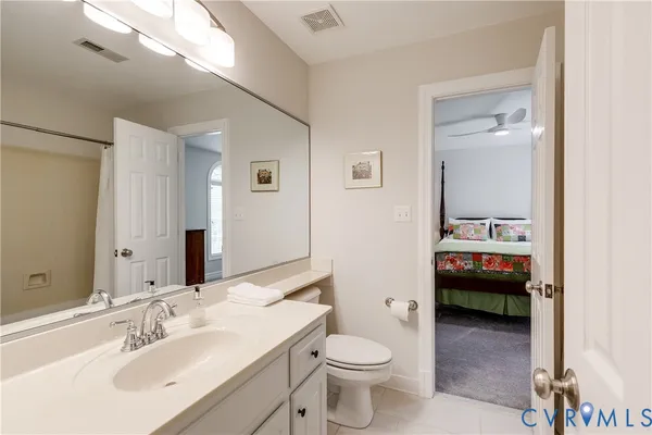 a kitchen with granite countertop a sink and a stove top oven