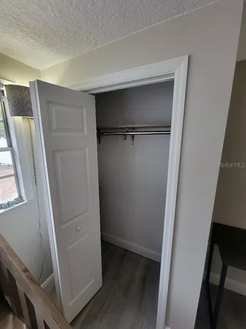 a view of a livingroom with a window