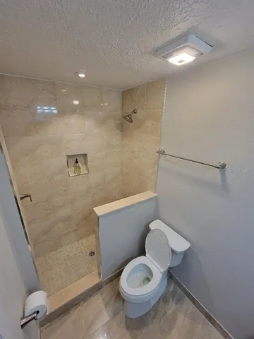 a view of a workspace with furniture