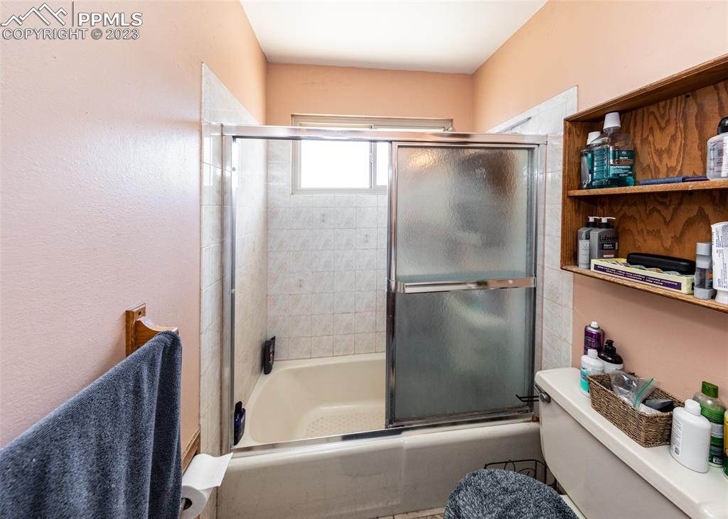 126 La Rochelle Drive Pueblo, CO 81005 - Photo 15 of 42 a bathroom with a bathtub and a shower