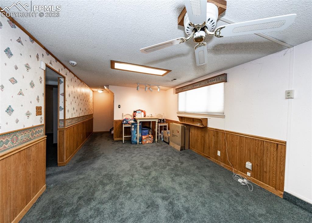 126 La Rochelle Drive Pueblo, CO 81005 - Photo 21 of 42 a view of a garage with chairs