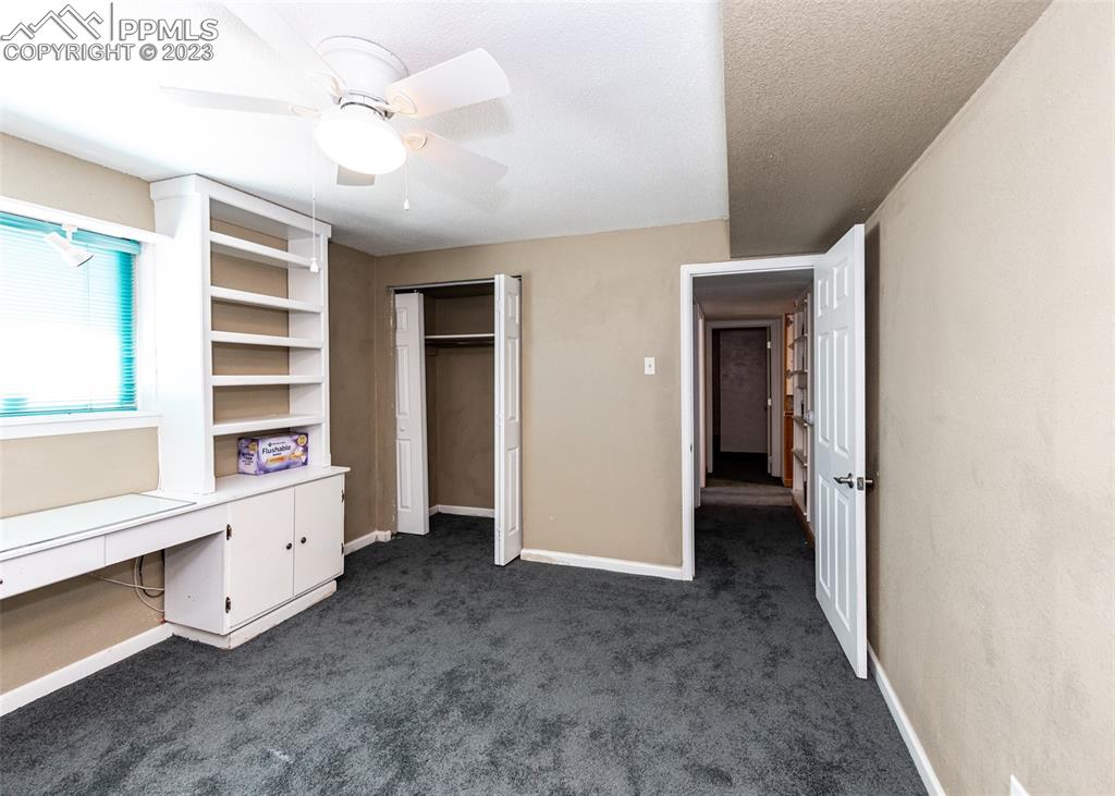 126 La Rochelle Drive Pueblo, CO 81005 - Photo 25 of 42 a view of an empty room with a window