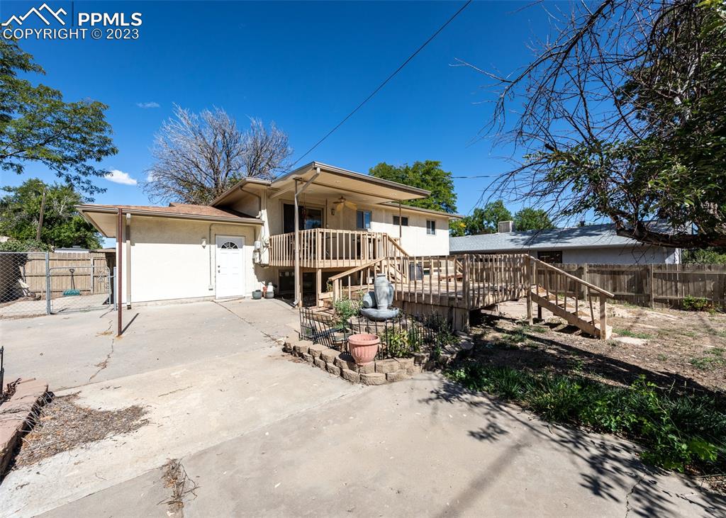 126 La Rochelle Drive Pueblo, CO 81005 - Photo 37 of 42 a view of a house with a yard