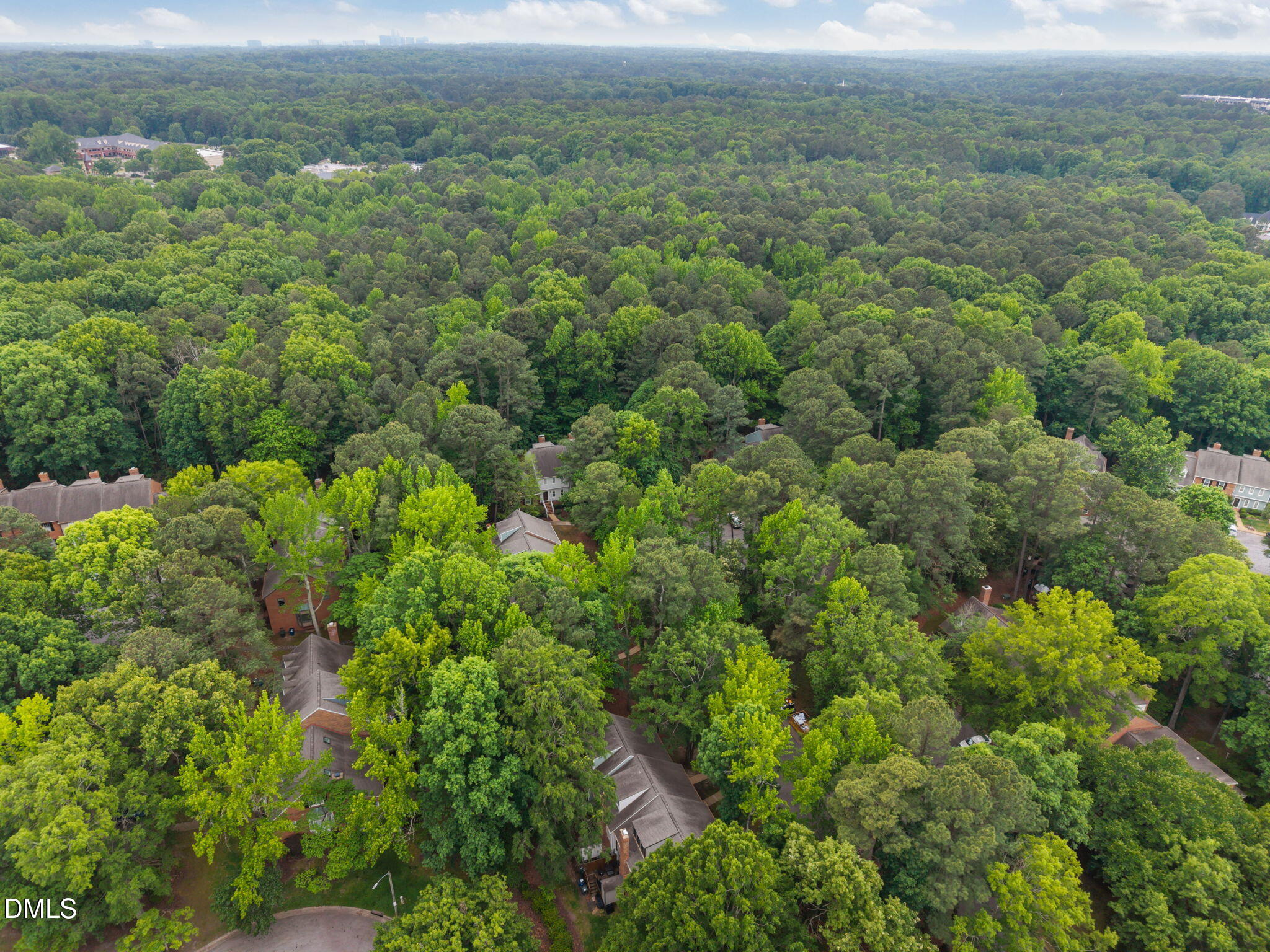 562 Weathergreen Drive Raleigh, NC 27615 - Photo 45 of 47 an aerial view of residential houses with outdoor space and trees
