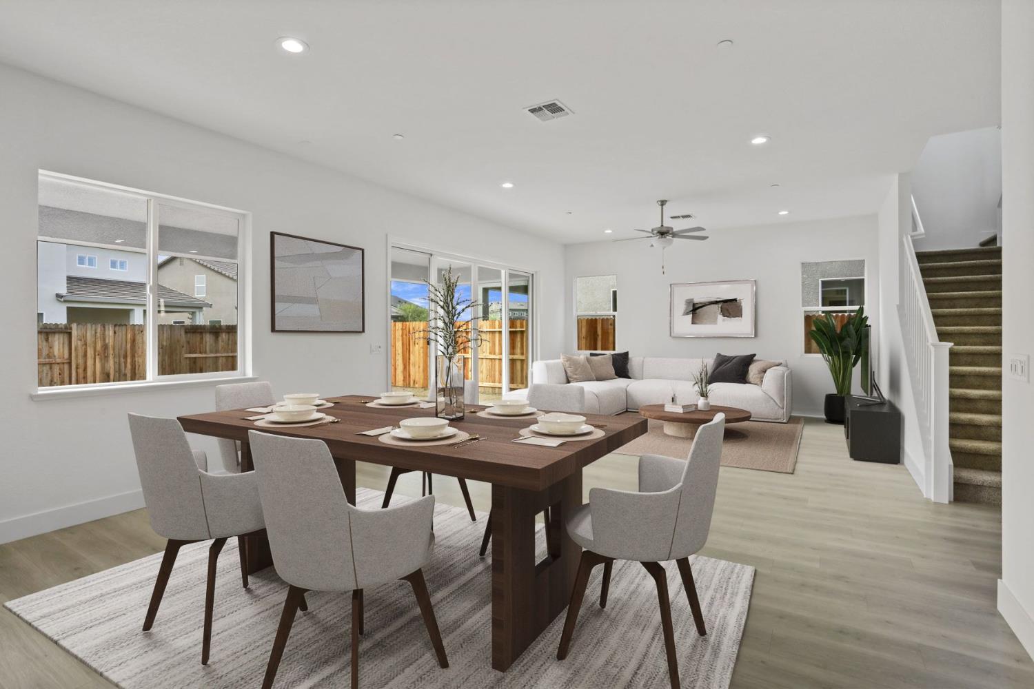 2291 Paramount Lane Manteca, CA 95337 - Photo 17 of 32 a view of a dining room with furniture and wooden floor