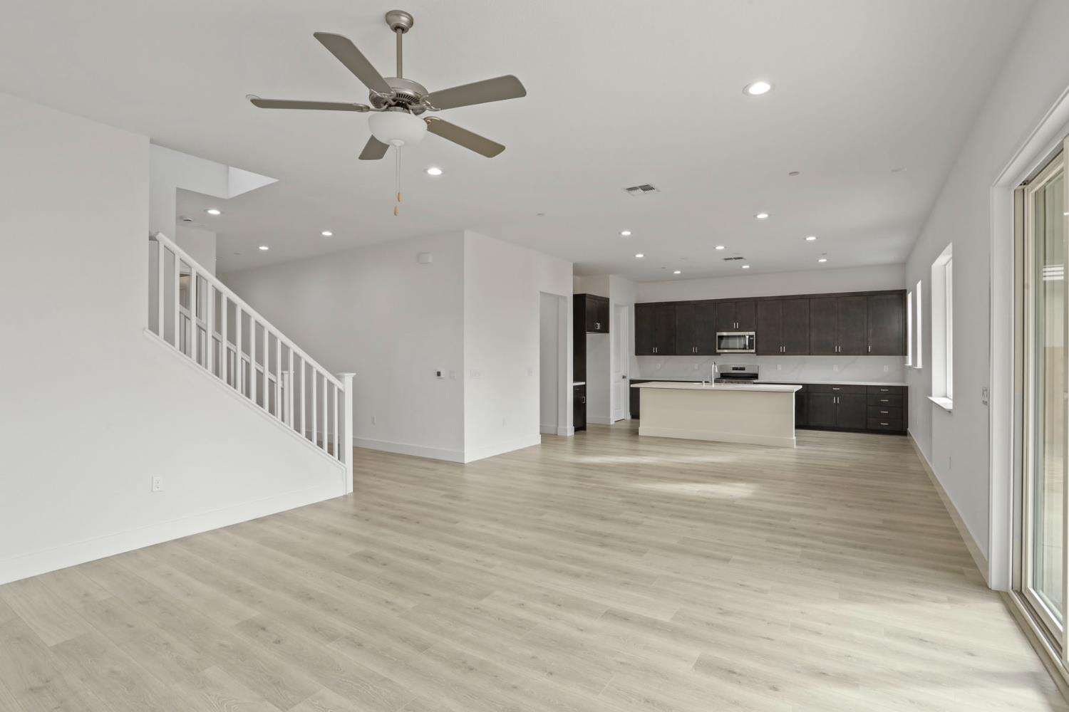 2291 Paramount Lane Manteca, CA 95337 - Photo 20 of 34 a view of kitchen with microwave and a refrigerator