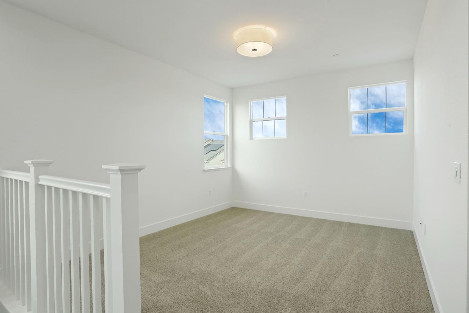 2291 Paramount Lane Manteca, CA 95337 - Photo 26 of 34 an empty room with windows