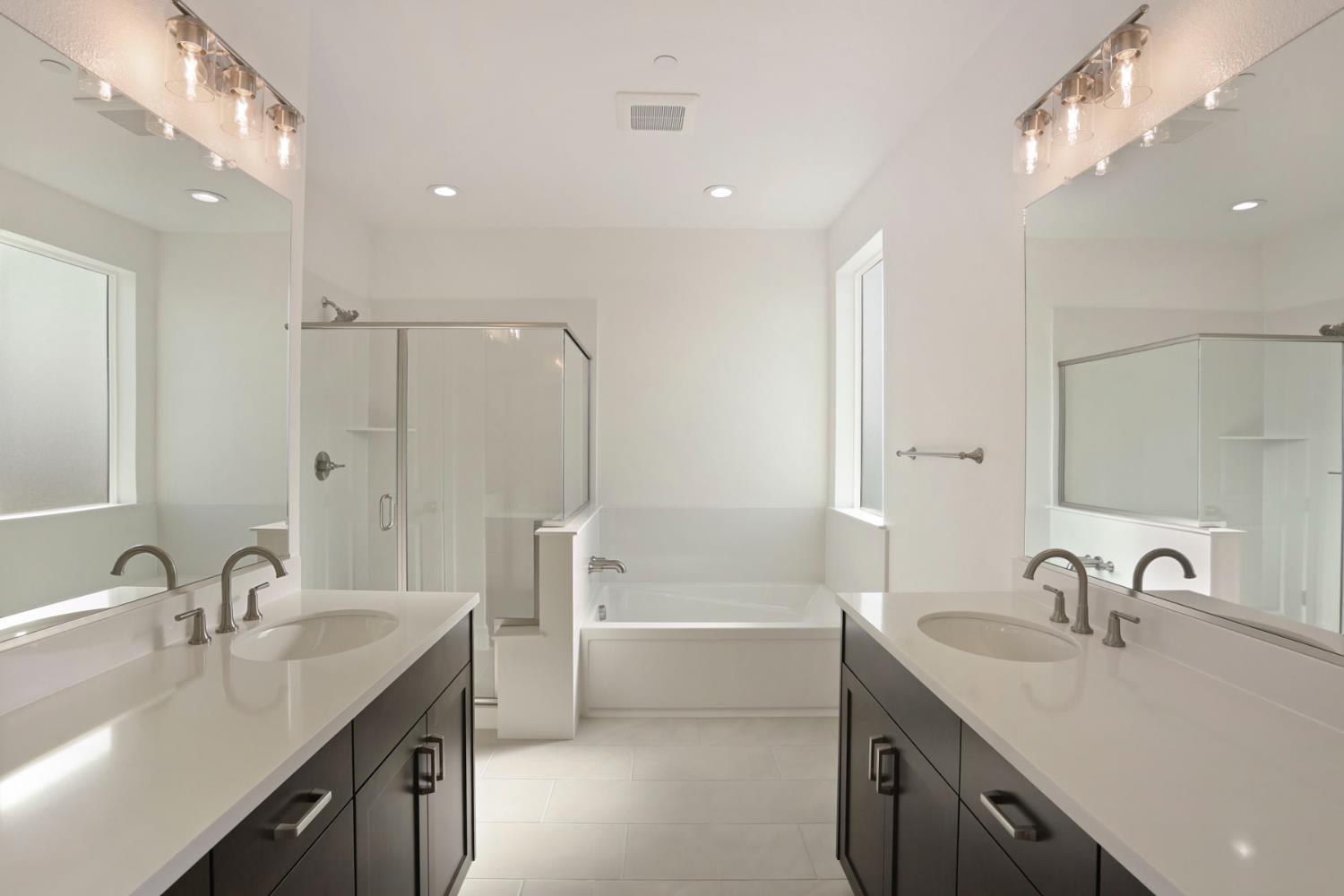 2291 Paramount Lane Manteca, CA 95337 - Photo 27 of 32 a bathroom with a sink double vanity and a tub
