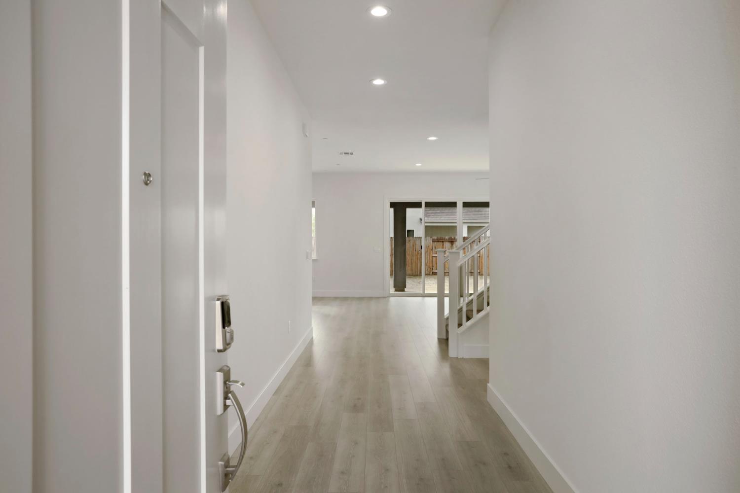 2291 Paramount Lane Manteca, CA 95337 - Photo 3 of 32 a view of entryway with wooden floor