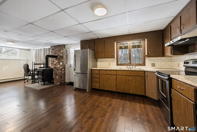a view of livingroom with furniture and wooden floor