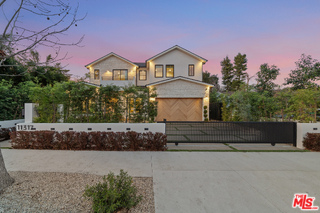 11317 Valley Spring Lane Studio City, CA 91602 - Photo 2 of 44 a front view of a house with a yard