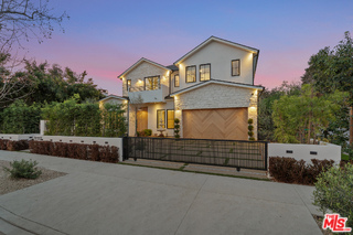 11317 Valley Spring Lane Studio City, CA 91602 - Photo 3 of 44 a front view of a house with a yard