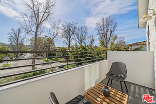 11317 Valley Spring Lane Studio City, CA 91602 - Photo 38 of 44 a view of a chairs and table on the terrace