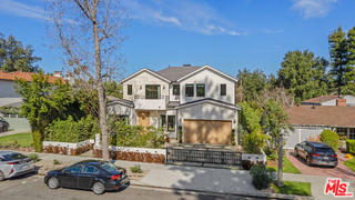 11317 Valley Spring Lane Studio City, CA 91602 - Photo 44 of 44 a car parked in front of a house