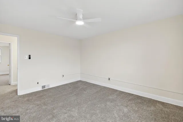 an empty room with an entryway