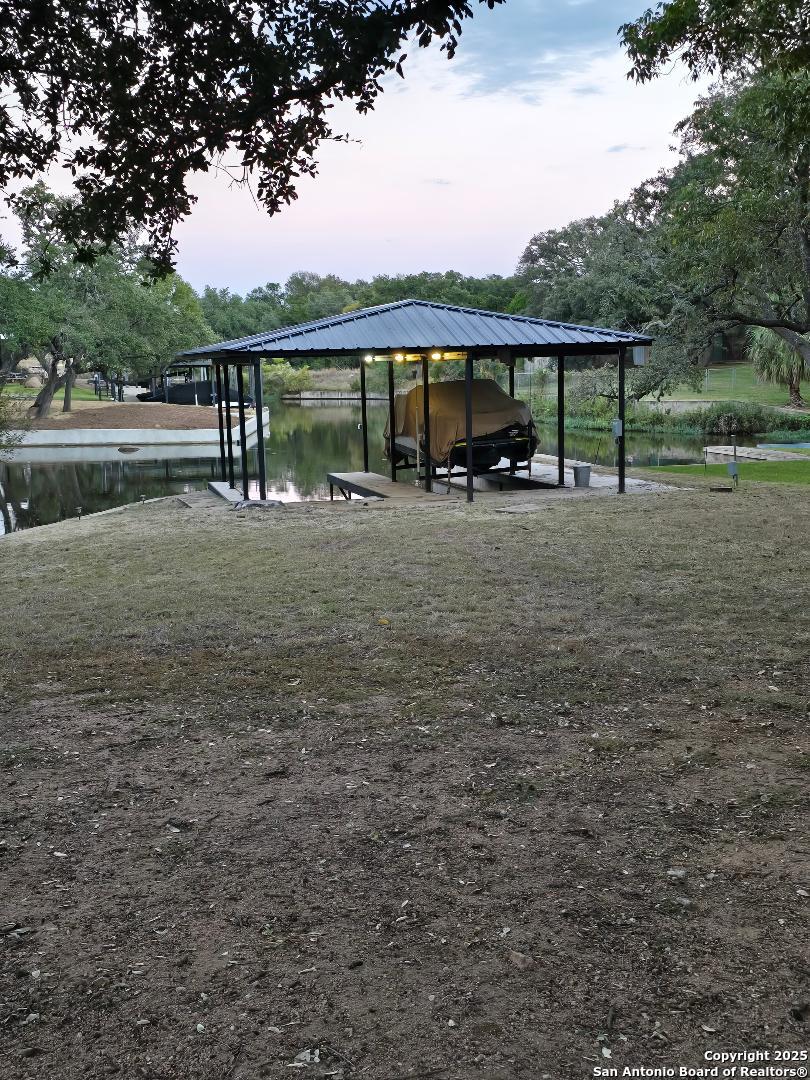 451 Legion Loop Kingsland, TX 78639 - Photo 17 of 23 a view of a lake with outdoor space