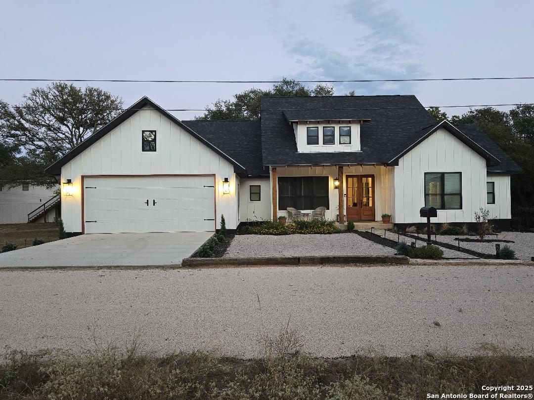 451 Legion Loop Kingsland, TX 78639 - Photo 2 of 23 a view of a house with a patio