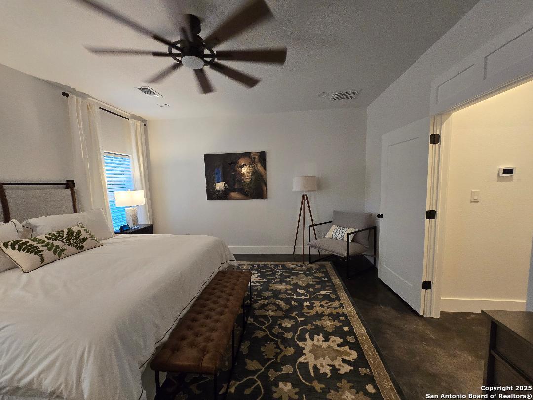 451 Legion Loop Kingsland, TX 78639 - Photo 5 of 23 a bedroom with a bed and a window