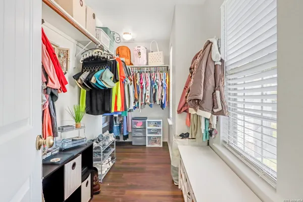 a view of a living room and entry way