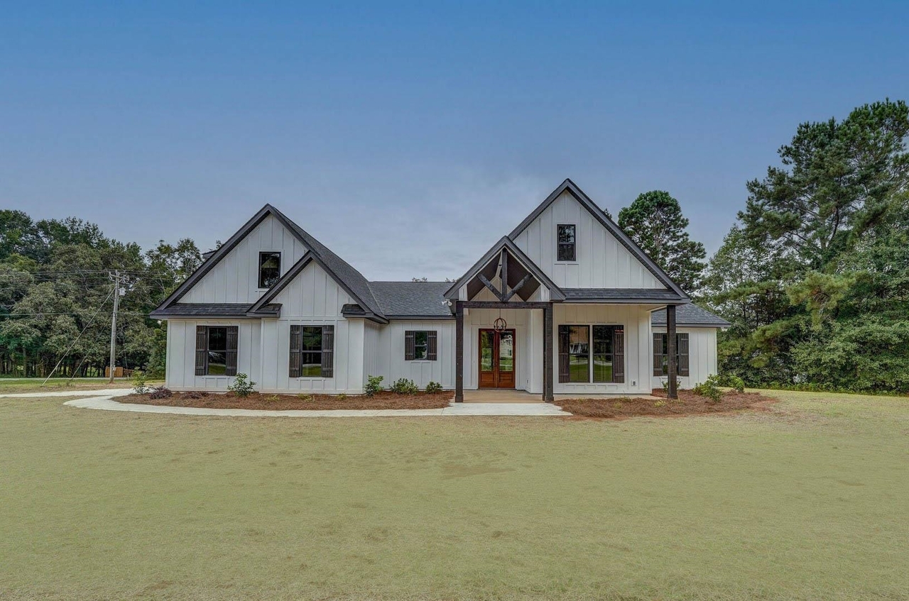 447 Biles Road, Unit 3 Jackson, GA 30233 - Photo 1 of 1 a front view of house with yard and green space