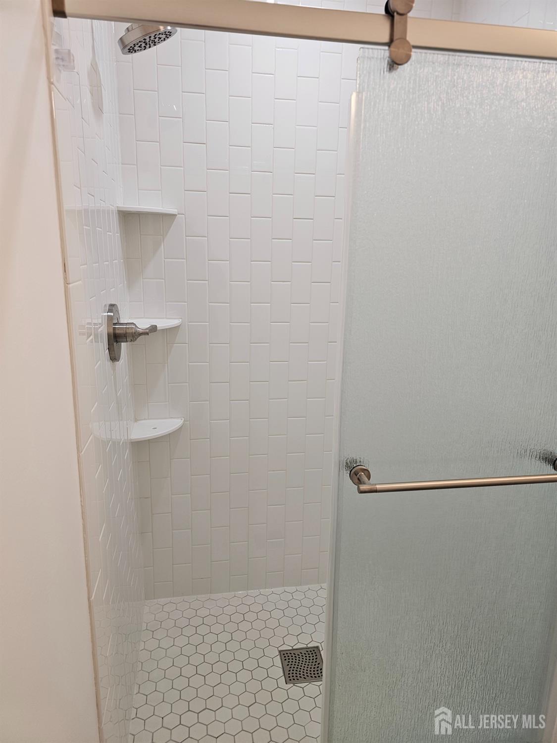 21 Brighton Way North Brunswick, NJ 08902 - Photo 20 of 20 a bathroom with a shower