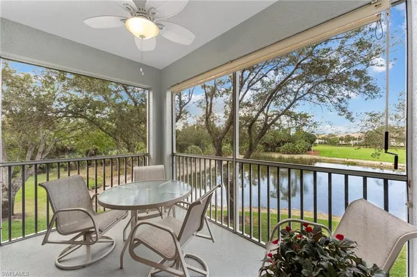 a view of a chairs and table in patio