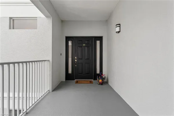 a view of a livingroom with wooden floor