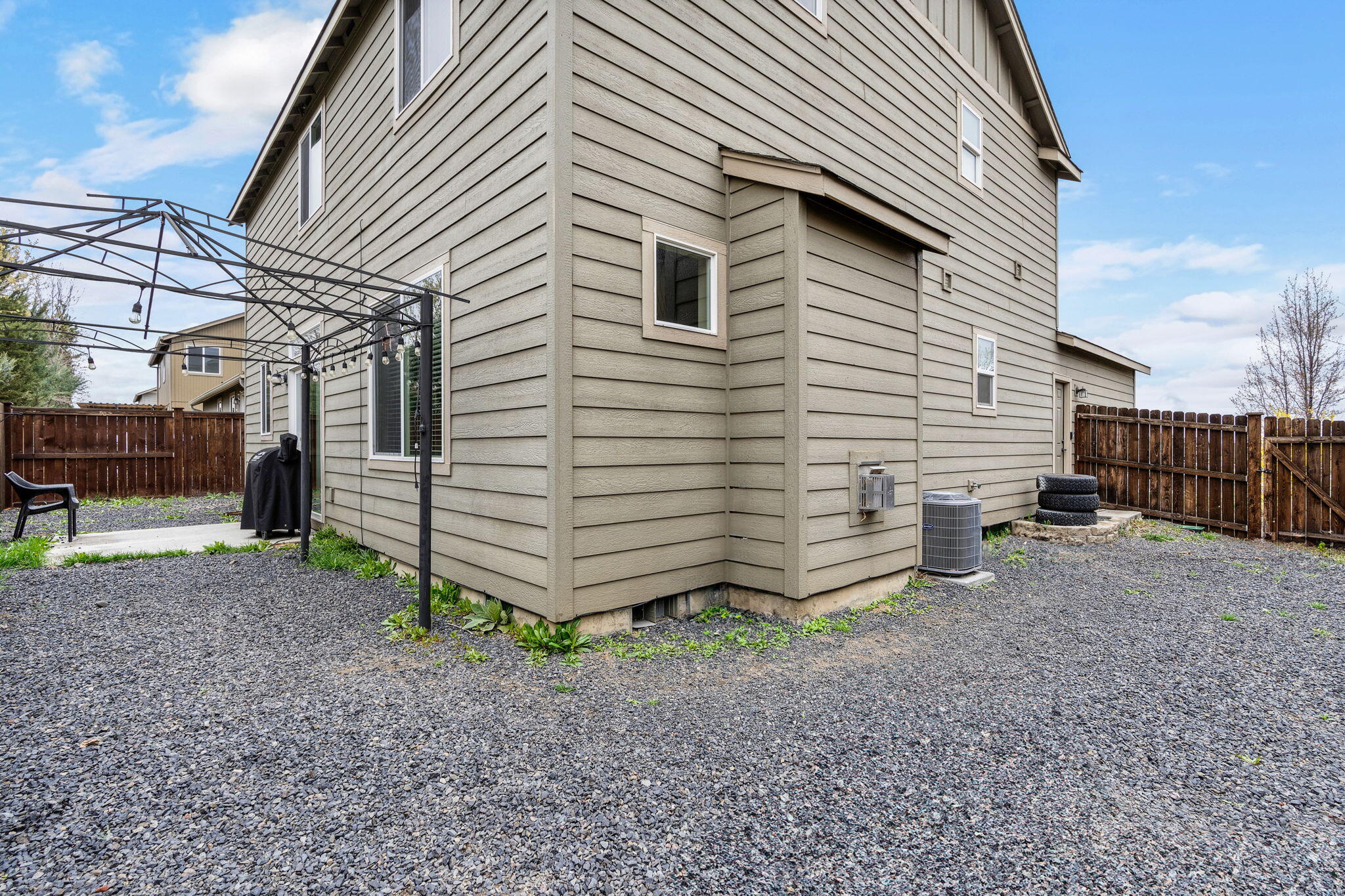2781 Northeast Spring Water Place Bend, OR 97701 - Photo 17 of 23 a view of a house with a yard