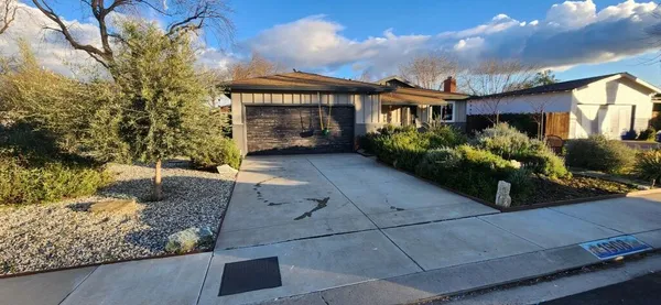 a front view of house with yard