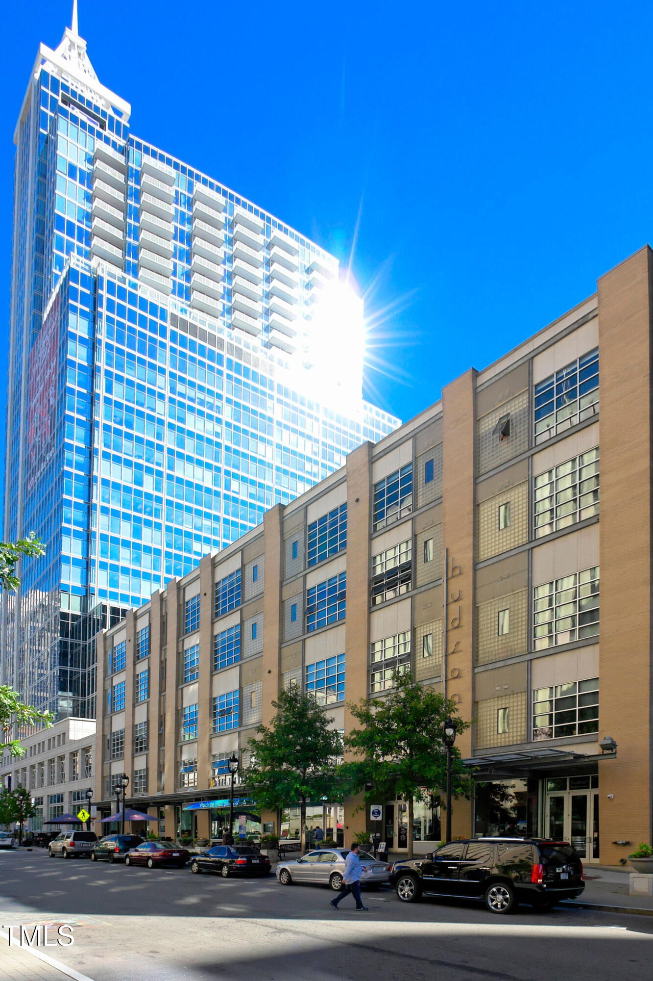 a front view of a building with street view