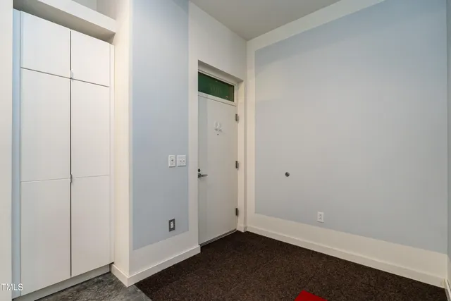 a kitchen with stainless steel appliances a sink a refrigerator and a stove