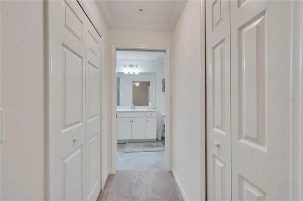 a bathroom with a shower sink and mirror