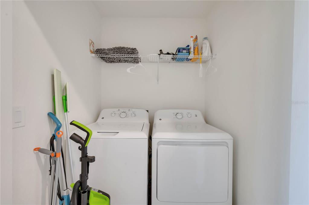 17510 Gawthrop Drive, Unit 203 Lakewood Ranch, FL 34211 - Photo 24 of 54 a utility room with dryer and washer
