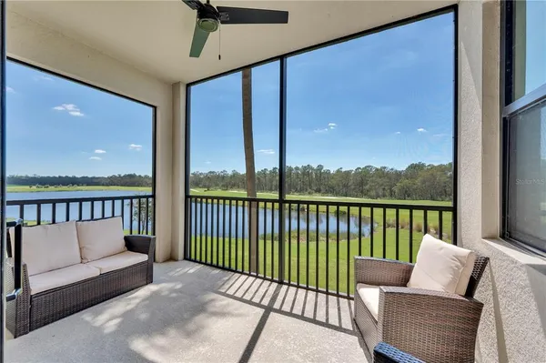 an aerial view of a house with garden space ocean view