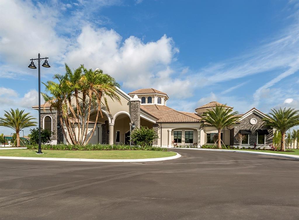 17510 Gawthrop Drive, Unit 203 Lakewood Ranch, FL 34211 - Photo 33 of 54 a front view of multiple houses with yard