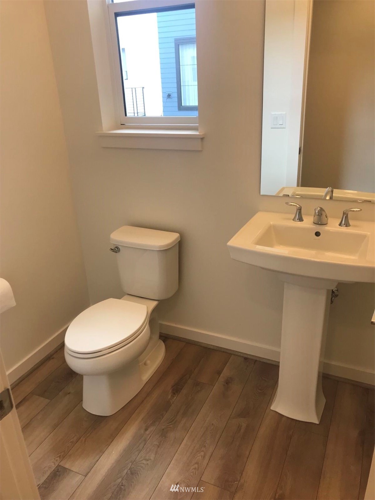 2405 217th Street Southeast, Unit B Bothell, WA 98021 - Photo 19 of 27 a bathroom with a sink toilet and a mirror