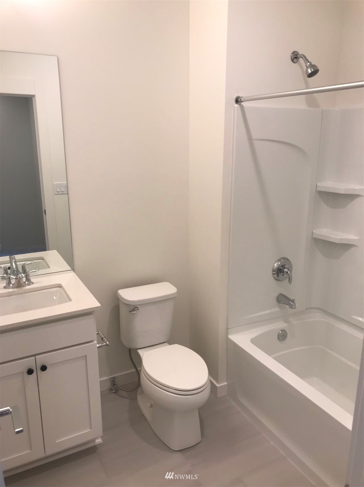 2405 217th Street Southeast, Unit B Bothell, WA 98021 - Photo 21 of 27 a bathroom with a sink a toilet and shower