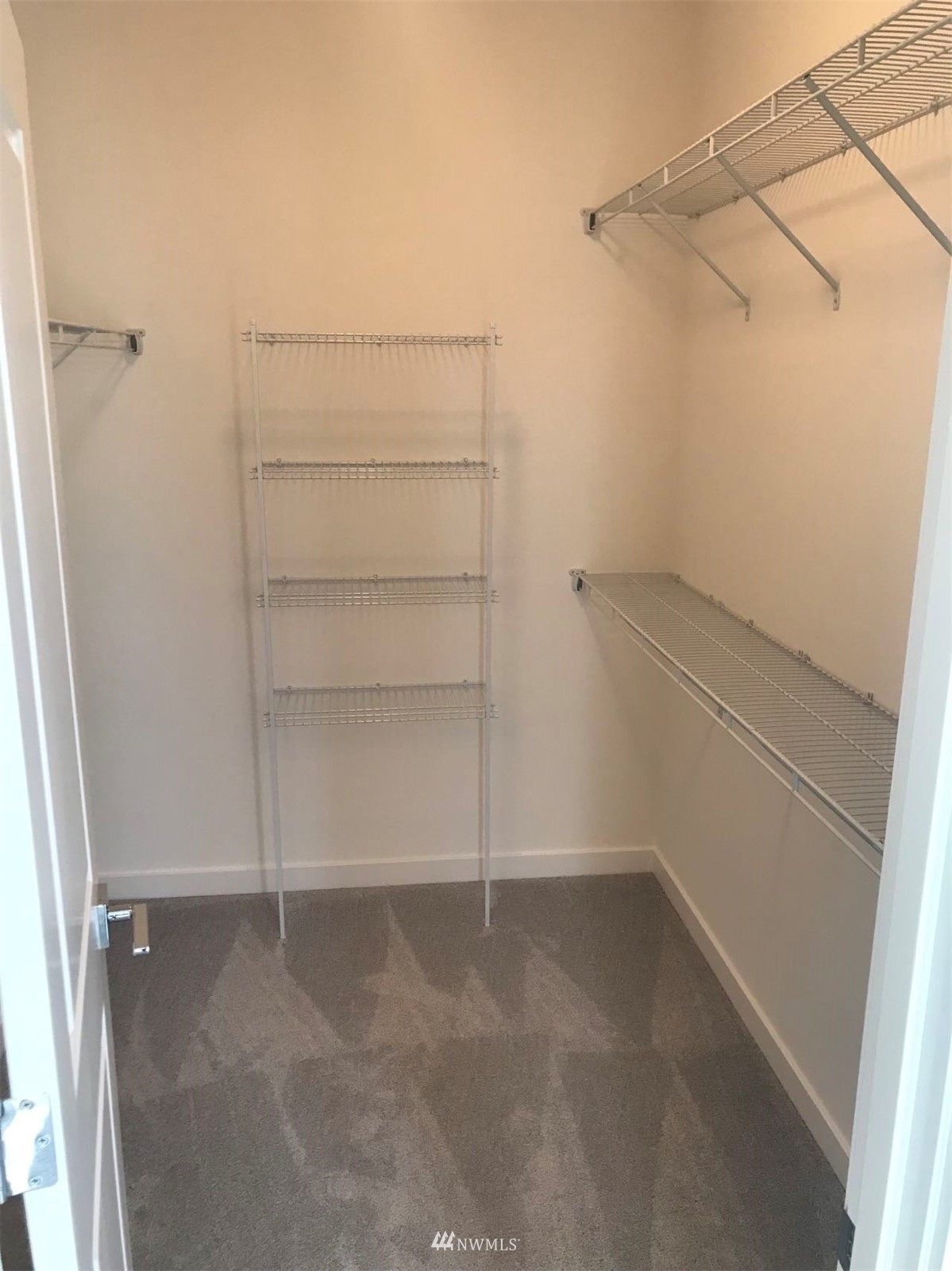 2405 217th Street Southeast, Unit B Bothell, WA 98021 - Photo 23 of 27 a view of an empty walk in closet