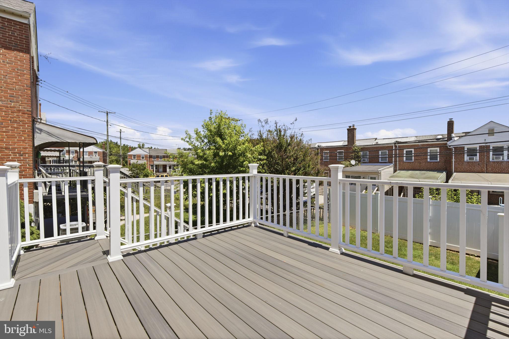 1627 Manor Road Baltimore, MD 21222 - Photo 18 of 24 Composite rear deck and fenced yard
