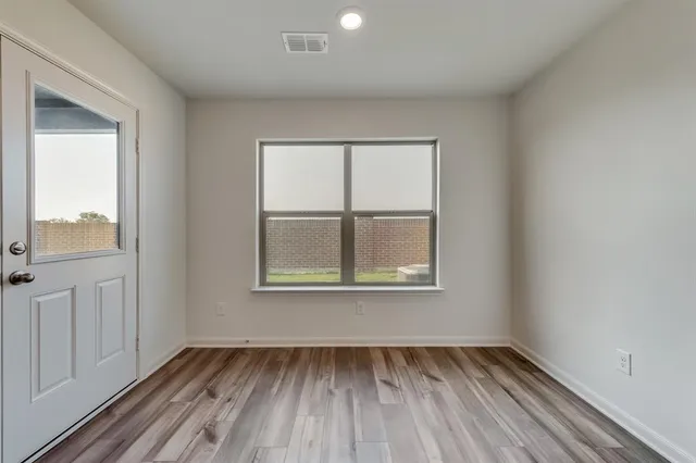 an empty room with window