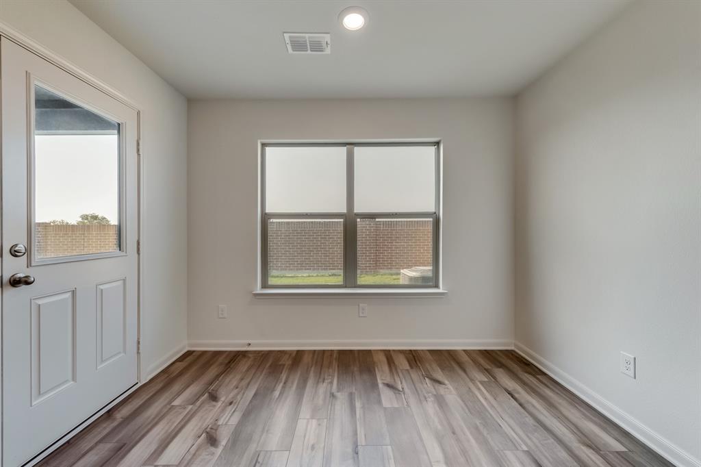 9516 Teton Vista Drive Fort Worth, TX 76140 - Photo 7 of 11 an empty room with window