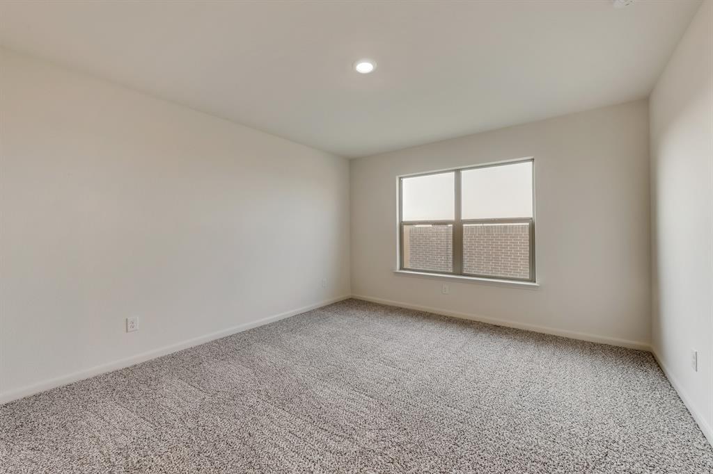 9516 Teton Vista Drive Fort Worth, TX 76140 - Photo 8 of 11 an empty room with a window