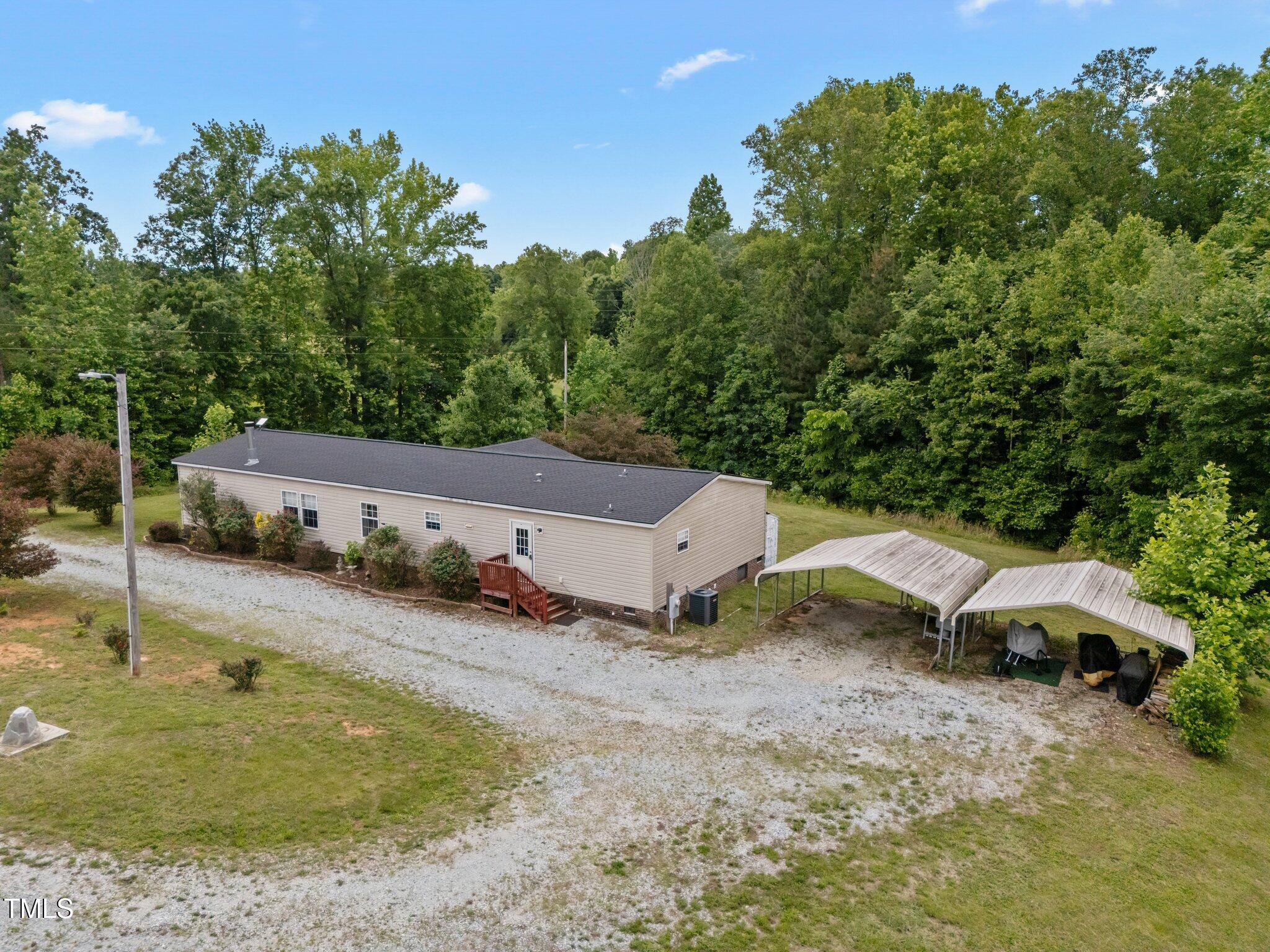 3415 Old Allensville Road Roxboro, NC 27574 - Photo 1 of 44 3-web-or-mls-DJI_20250522134922_0035_D