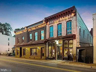a view of a building with a street