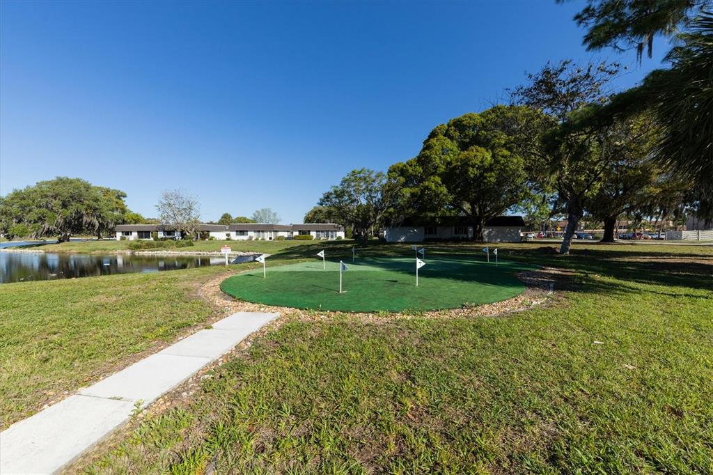 3990 Overlook Bend Terrace, Unit 19 Sarasota, FL 34232 - Photo 27 of 29 a view of a golf course